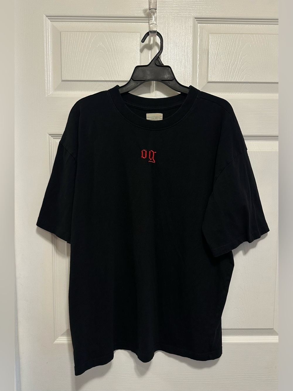Essentials Black Short Sleeve Tee with Small Red Chest Logo